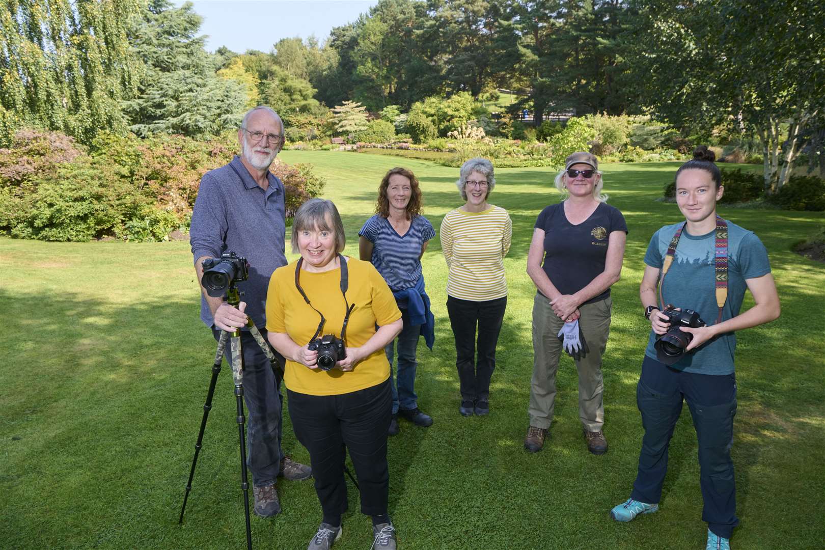 One of the garden events with (from left) nature photography lecturer Dave Freeman, keen photographer Christine Robinson, gardener Pam Cummings, organiser Anne Sutherland, head gardener Fiona Mackenzie, and another keen photographer Becky Dingwall.