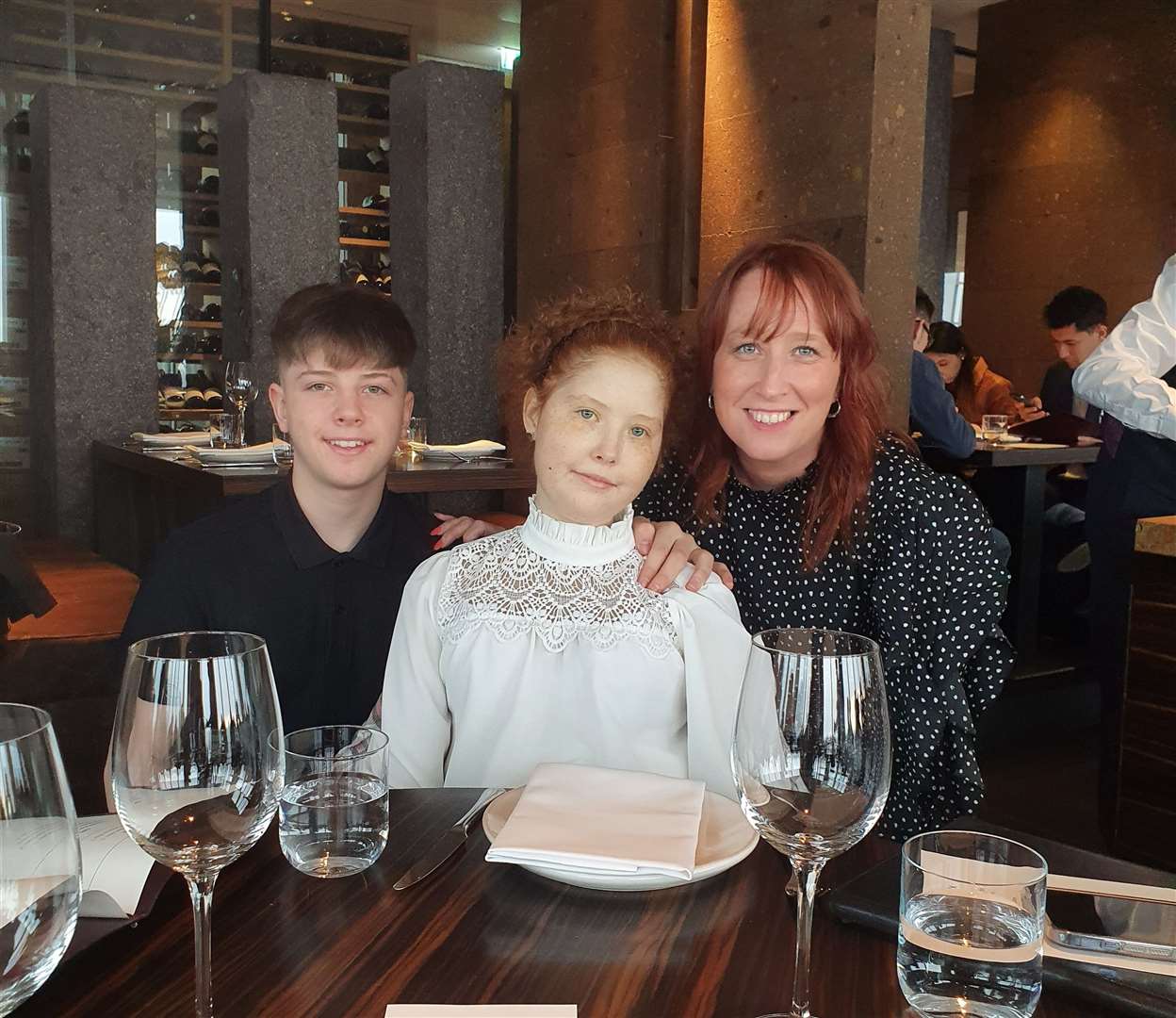 Harry Fraser, Maisie Fraser and Cecilia Smith at the Shard in London.
