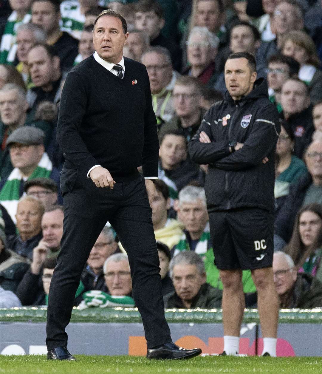 Malky Mackay (left) and Don Cowie, here at Celtic Park, guided the players through a busy spell before the World Cup break. Picture: Ken Macpherson
