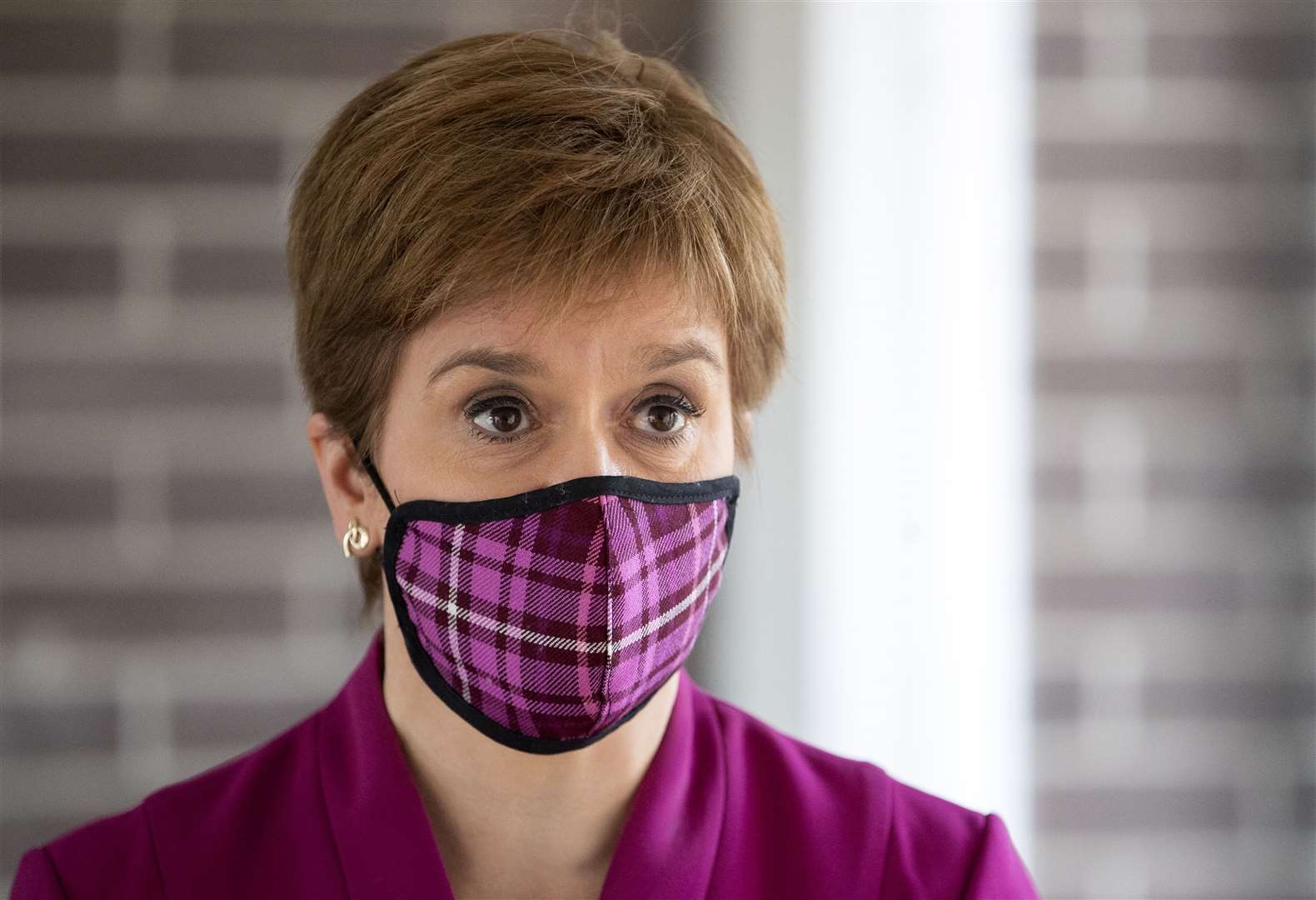 Nicola Sturgeon said the lockdown restrictions in the three local authority areas would be kept under review (Jane Barlow/PA)