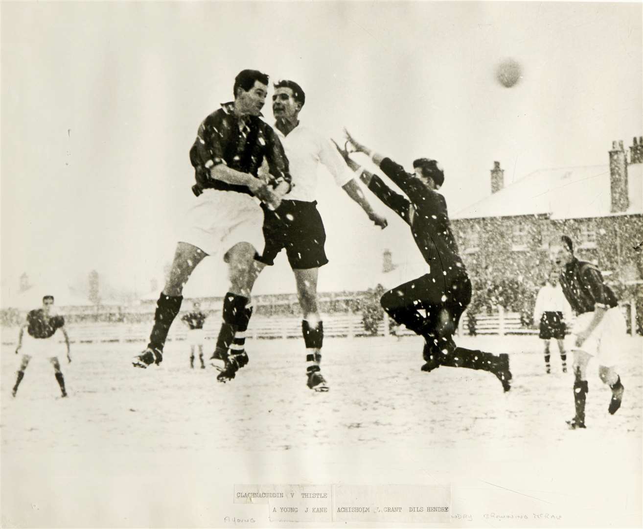 An aerial dual in a Thistle versus Clach game at Kingsmills in the 60s.