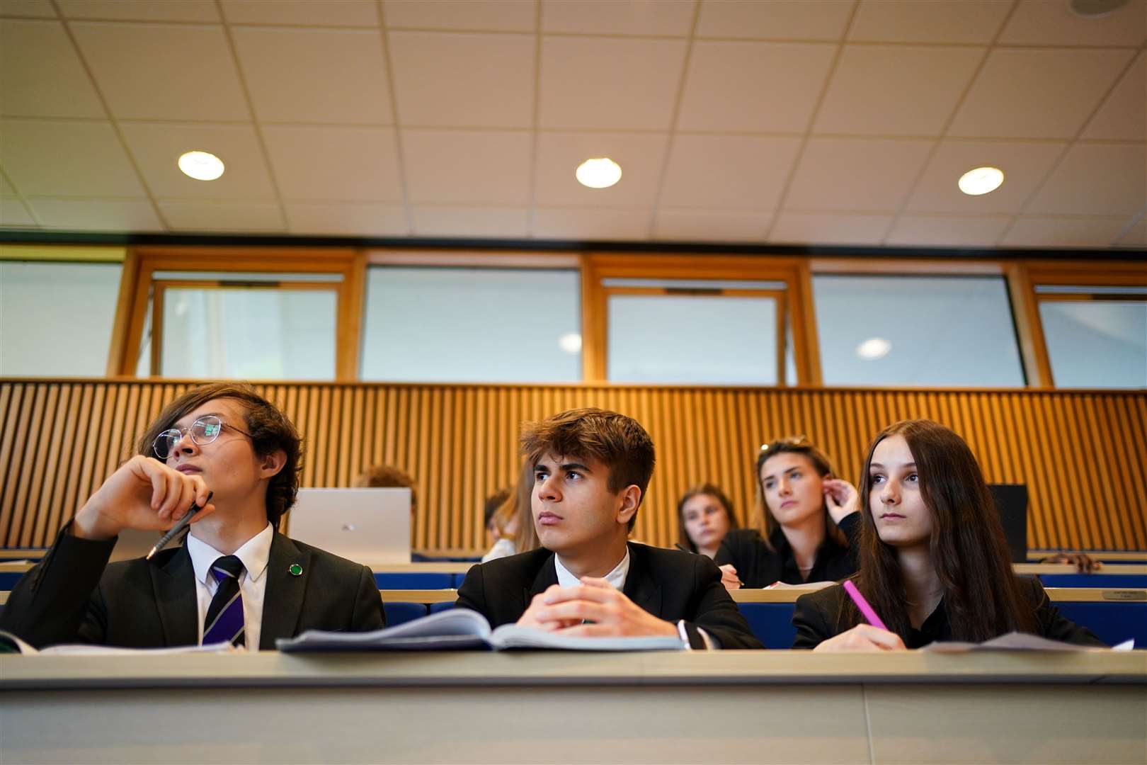 Ukrainian students George Kravetskyi, Maryan Prydatko and Valeria Khrystiuk in class at Wrekin College in Telford, Shropshire (Jacob King/PA)