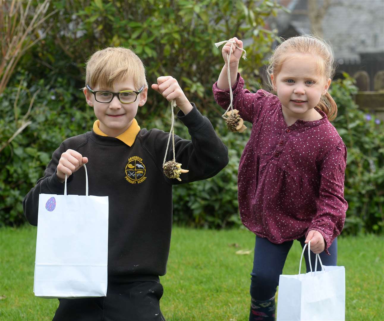 Ardersier community Easter gift bags..Eloise(3) and William(7) Robin with Easter gift bags that let you make bird feeder cones and other craft fun...Picture: Gary Anthony..