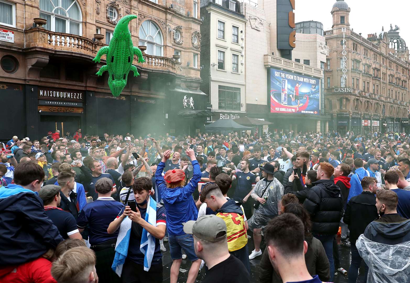 An inflatable crocodile was among the Scotland fans gathered in Leicester Square (Kieran Cleeves/PA)