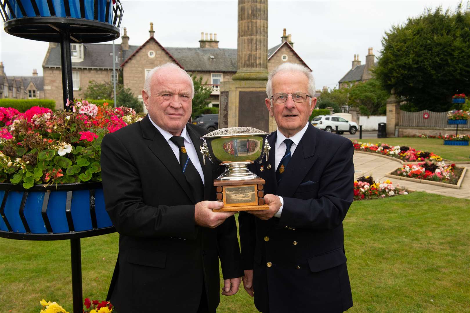 Nairn Royal British Legion Welfare Officer Garnet Main and President Bob Towns with the trophy.