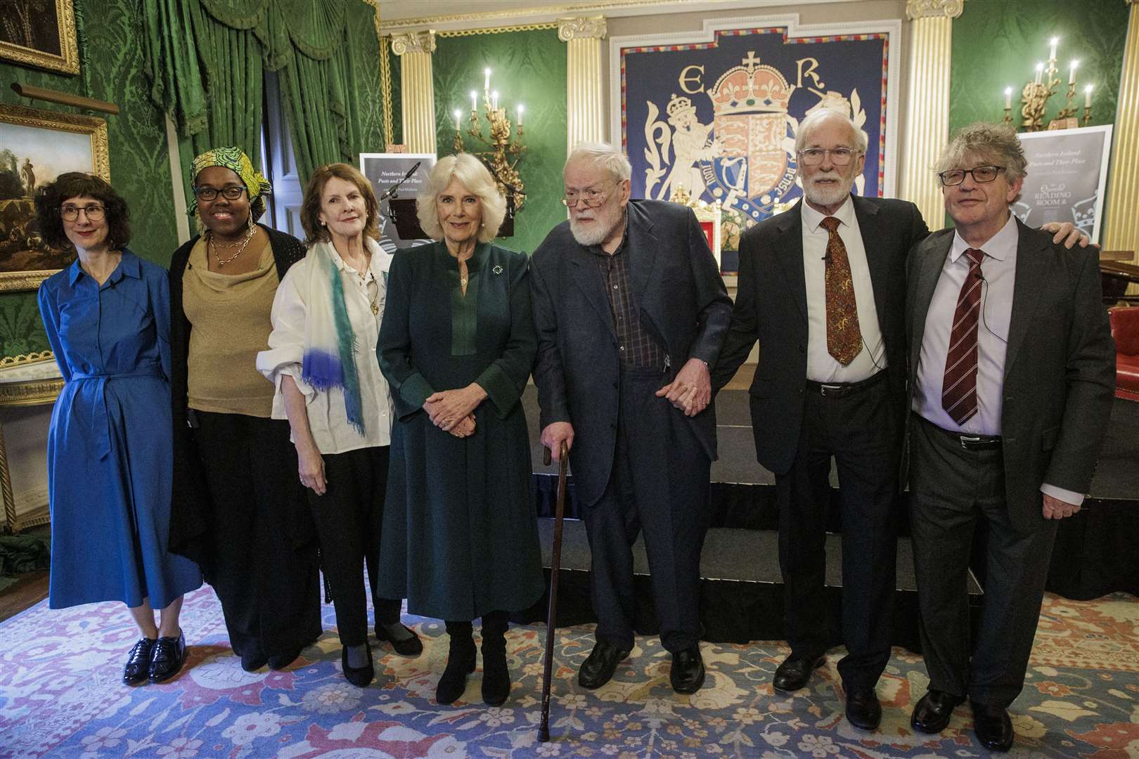 Camilla with (left to right) poet Sinead Morrissey, Jamaican poet Raquel McKee, actor Frances Tomelty, contemporary poet Micheal Longley, actor Ian McElhinney and poet Paul Muldoon (Liam McBurney/PA)