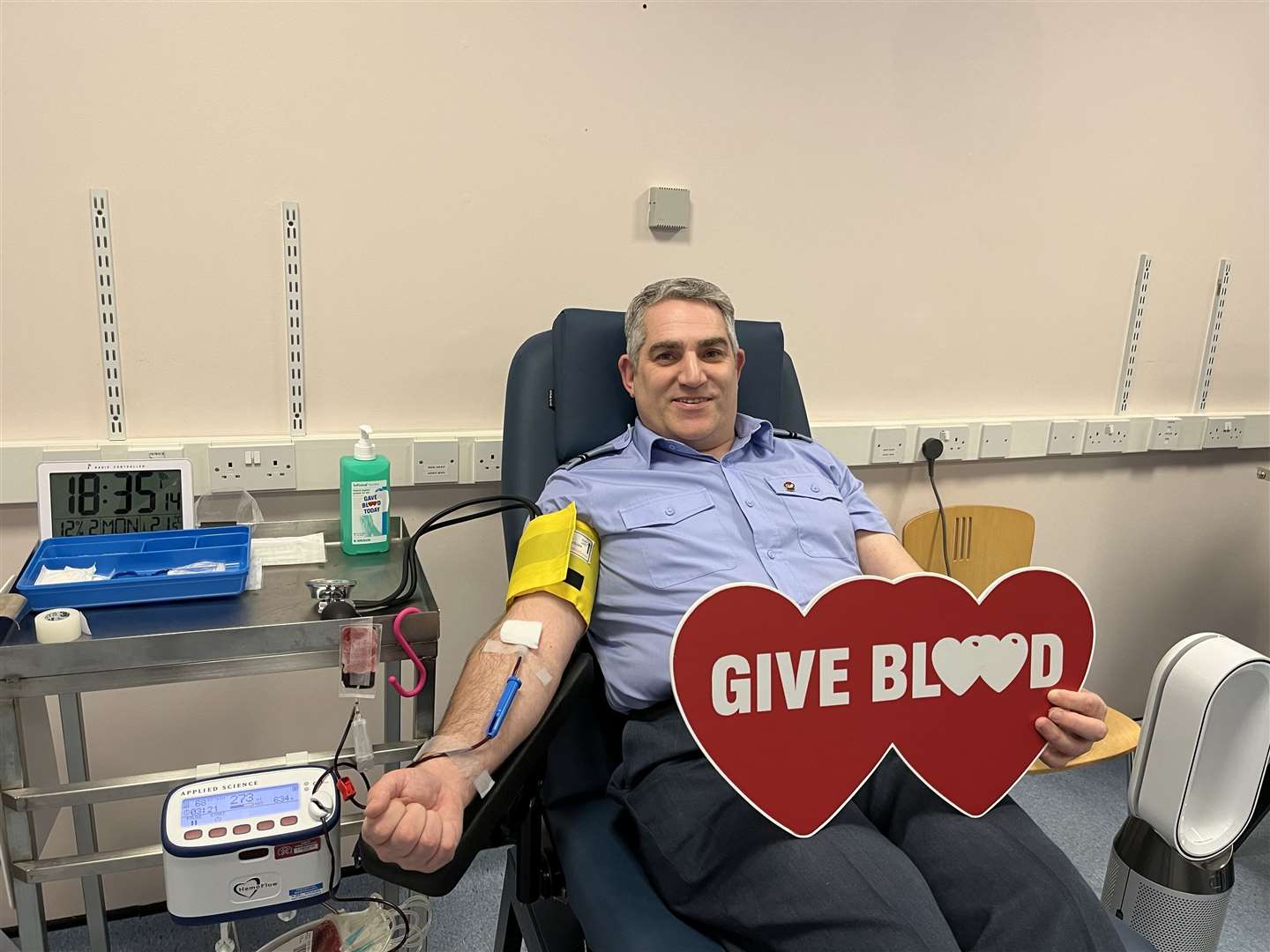 Air cadet commanding officer Neil Jack making his 50th blood donation in Inverness.