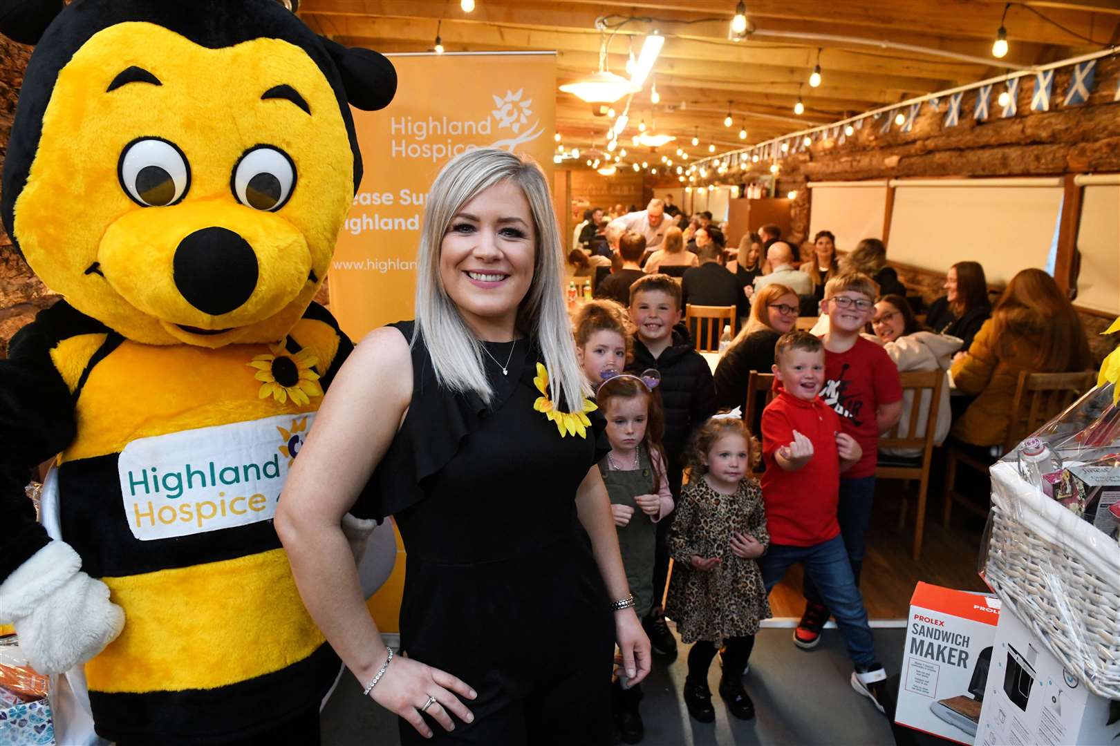 Donna Carolyn Fraser with Bobby the Bee and people who came along for the bingo. Picture: James Mackenzie