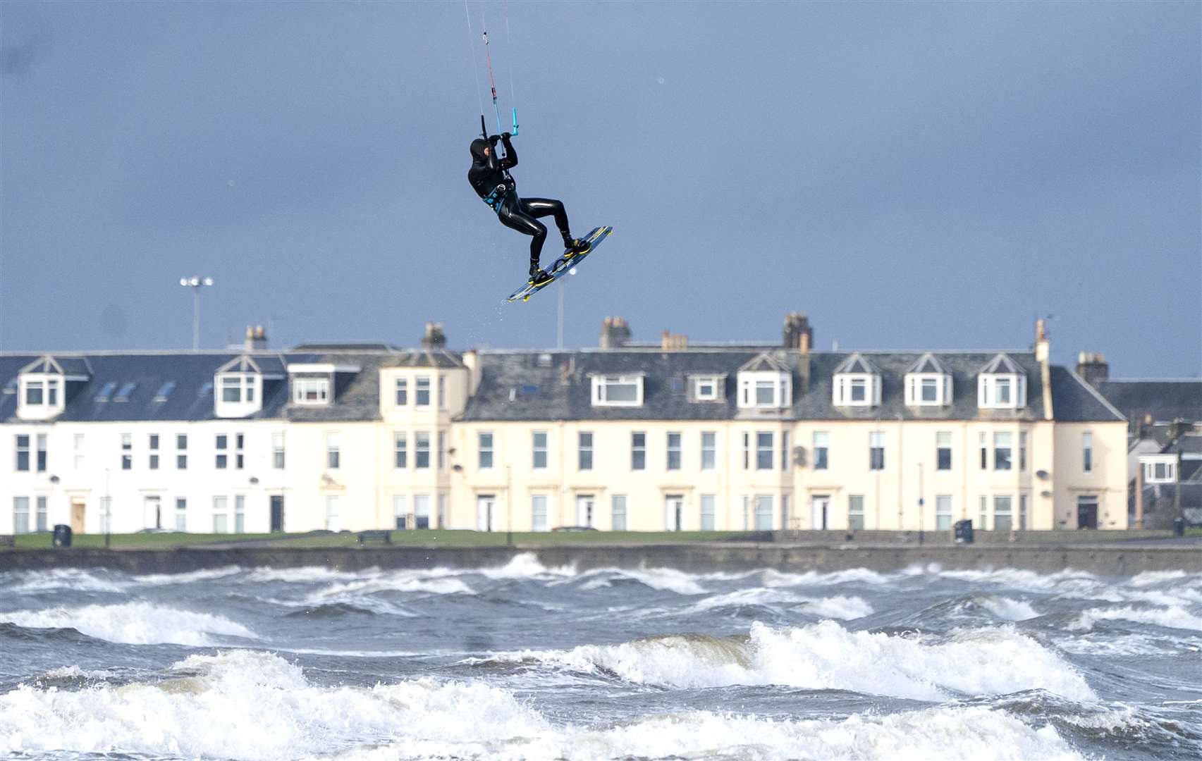 A kitesurfer soared above Troon during the Kitesurf Scotland Big Air event off the South Ayrshire coast in February (Jane Barlow/PA)