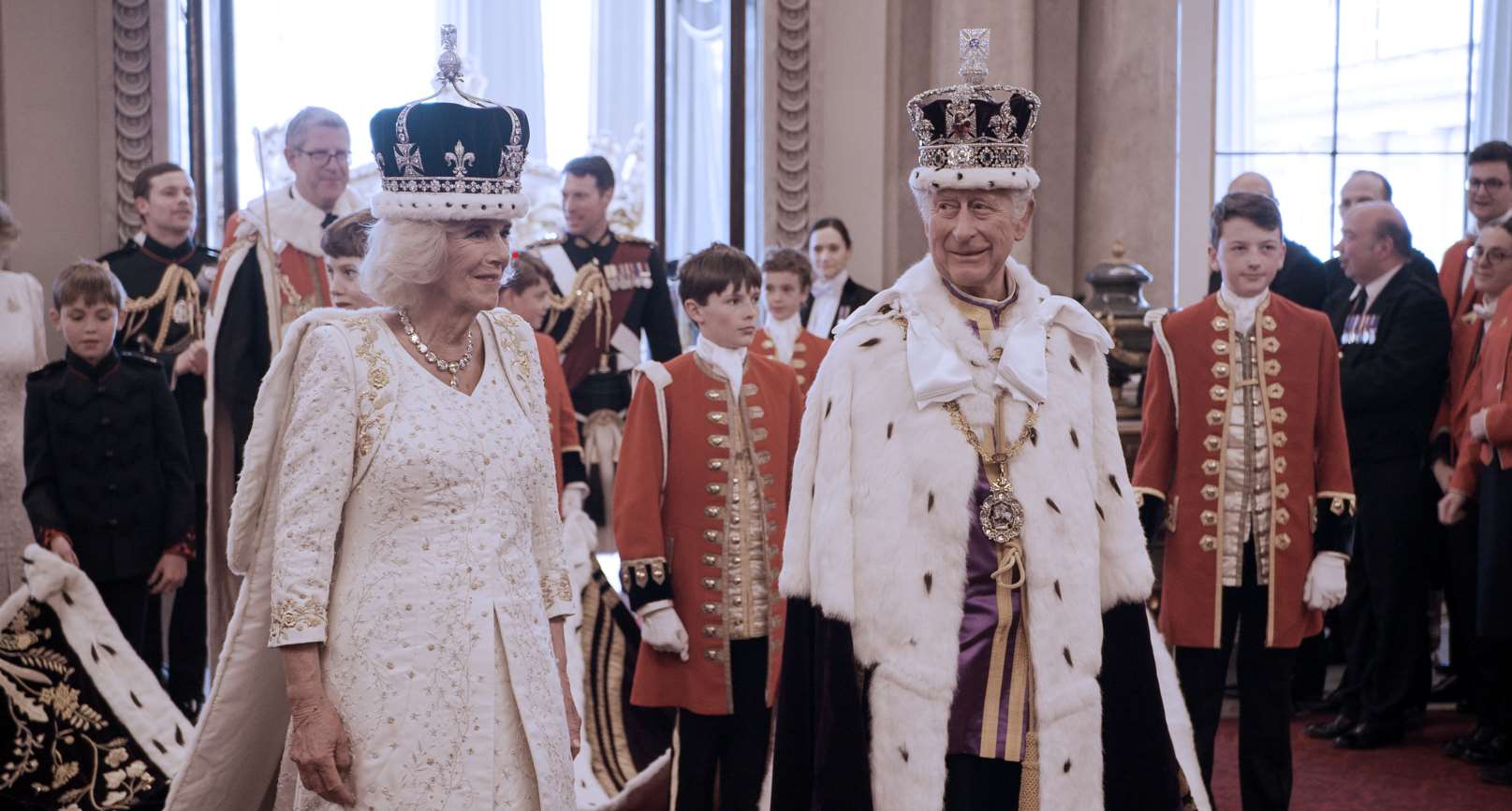 Camilla and Charles dressed in full regalia arrive back at Buckingham Palace after the coronation (BBC/Oxford Film and Television)