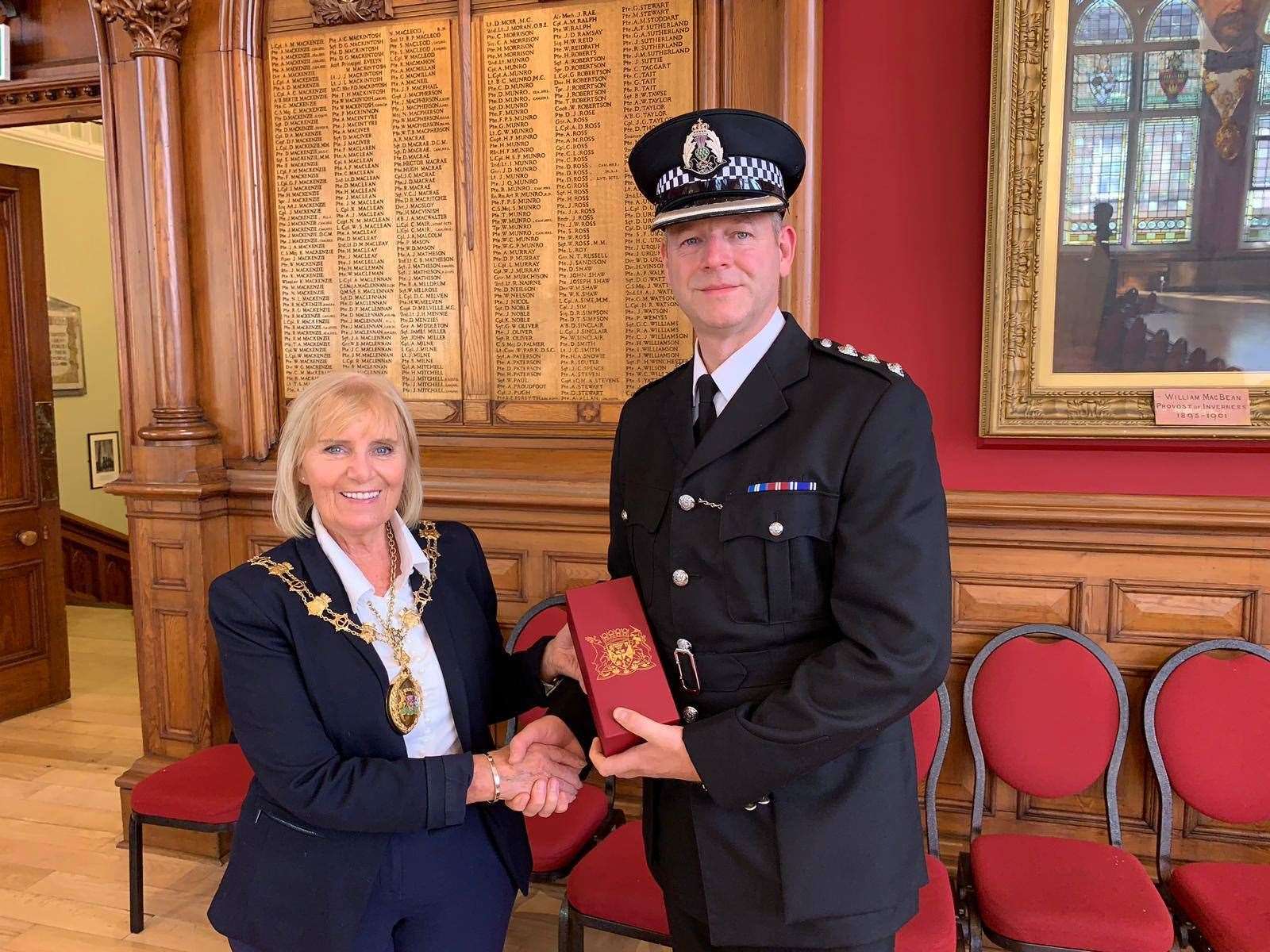 Chief Inspector Gough with Inverness Provost Helen Carmichael at a presentation earlier this week to thank him for his service.
