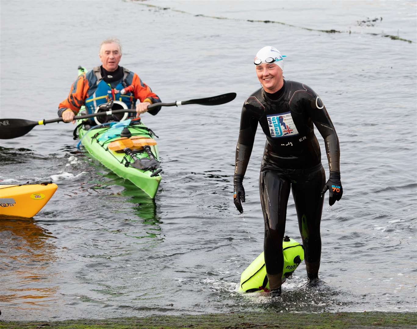 Jasmine Harrison sets foot on dry land at John O'Groats harbour at the end of her record breaking Lejog swim. Picture: Simon Price/Firstpix