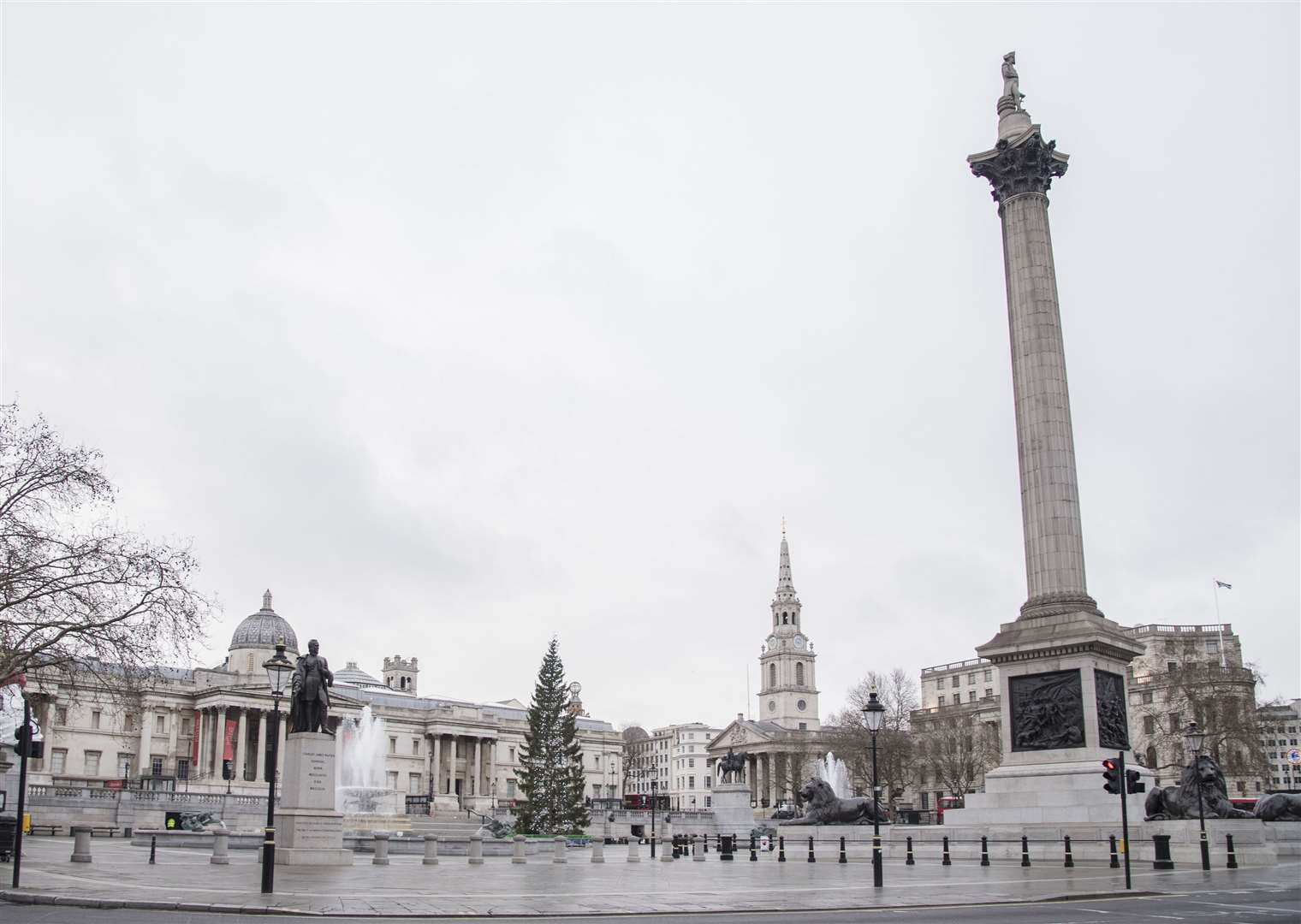 Tourist magnet Trafalgar Square was free of the hordes (Ian West/PA)