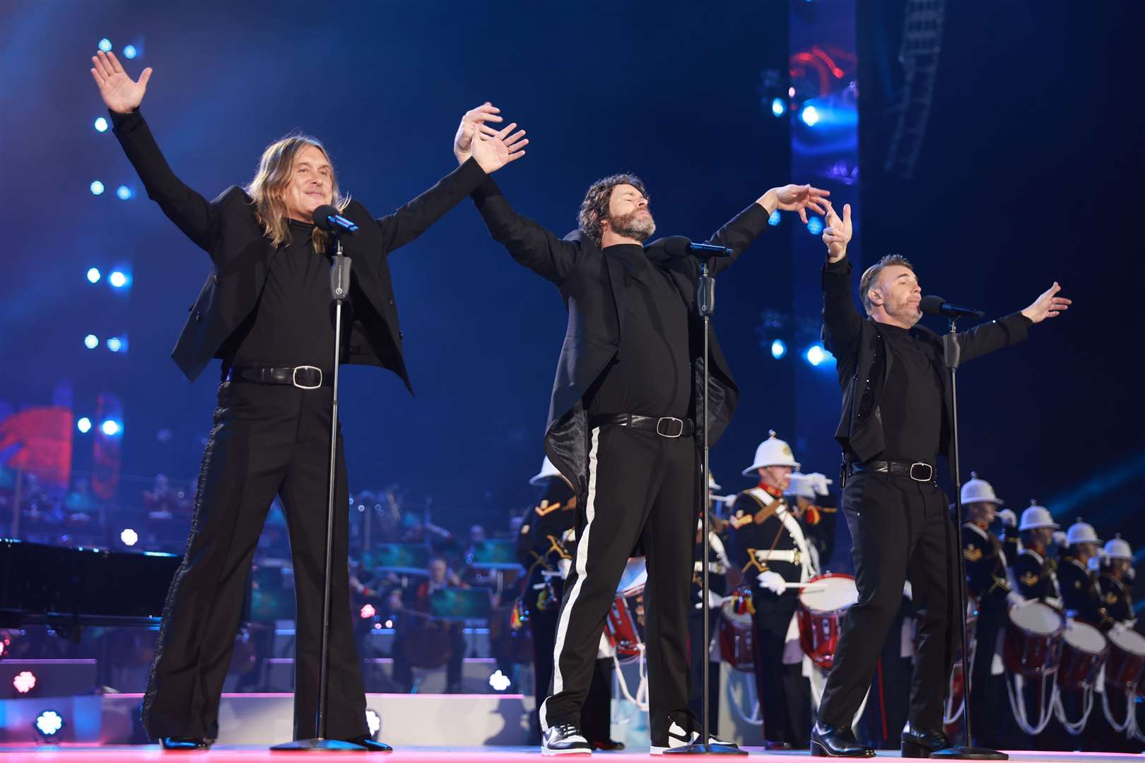 Take That perform on stage at the Coronation Concert (Chris Jackson/PA)