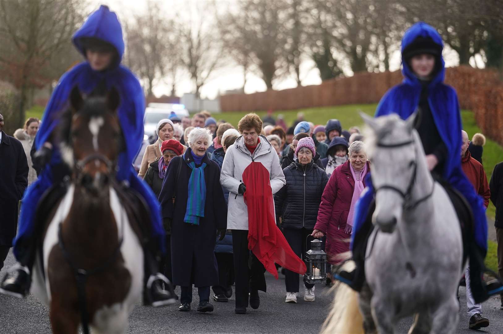 Theresa Kilmurray, of the Brigidine Congregational Leadership Team (centre), along with Sister Rita Minahen (left), carries the relic of St Brigid during the procession (Brian Lawless/PA)