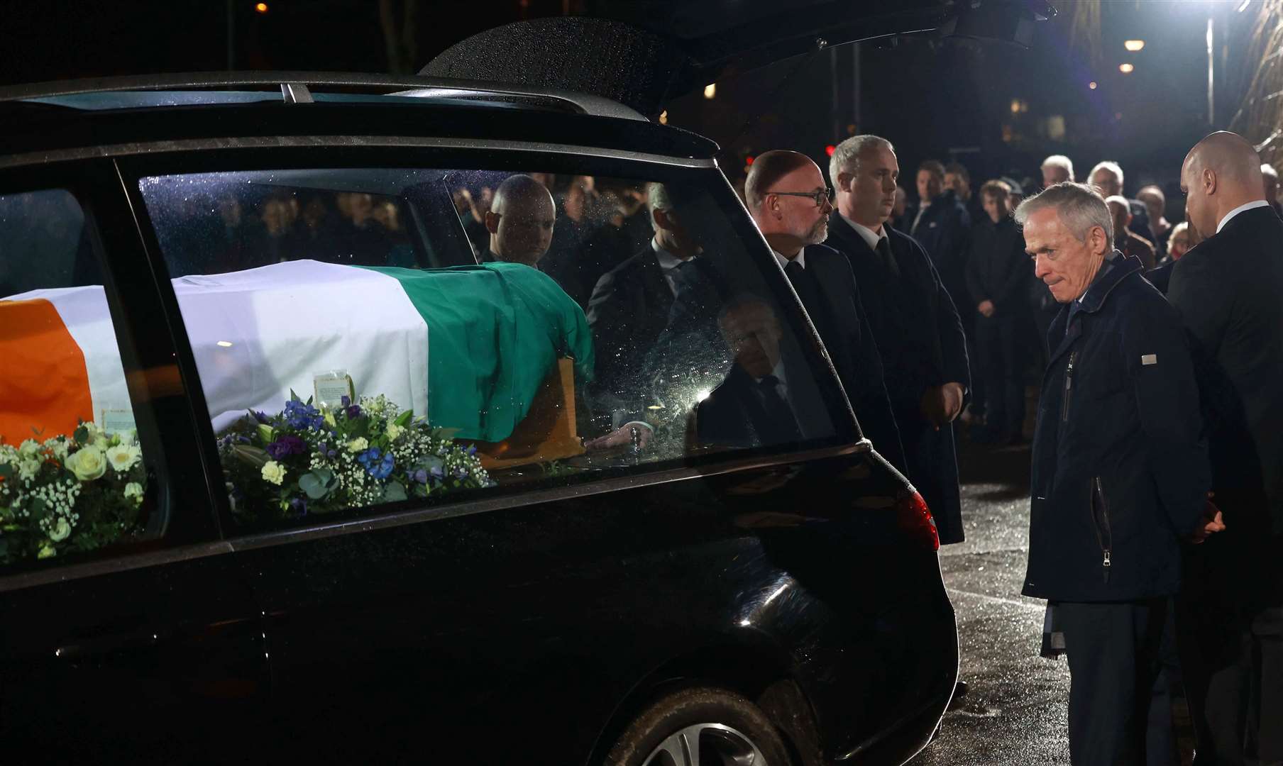 The coffin of former taoiseach John Bruton arriving at St Peter and Paul’s Church in Dunboyne (Julien Behal/Government Information Service)