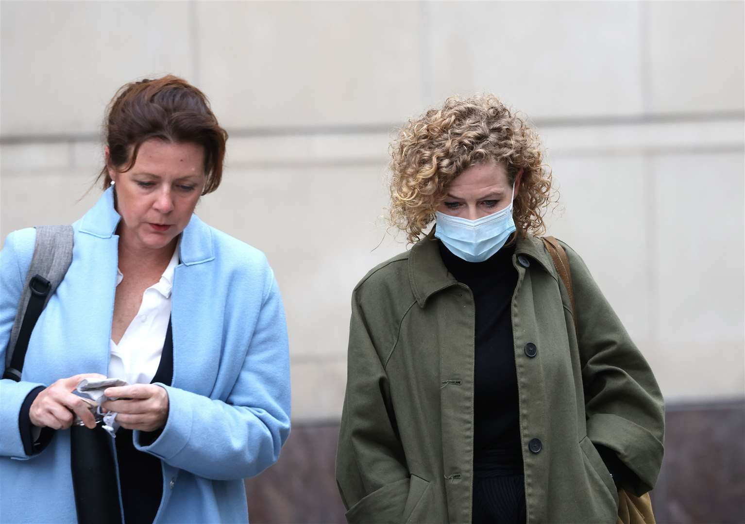 Fiona Donohoe (right) leaves Laganside Courts in Belfast with barrister Brenda Campbell QC after a hearing last year (PA)