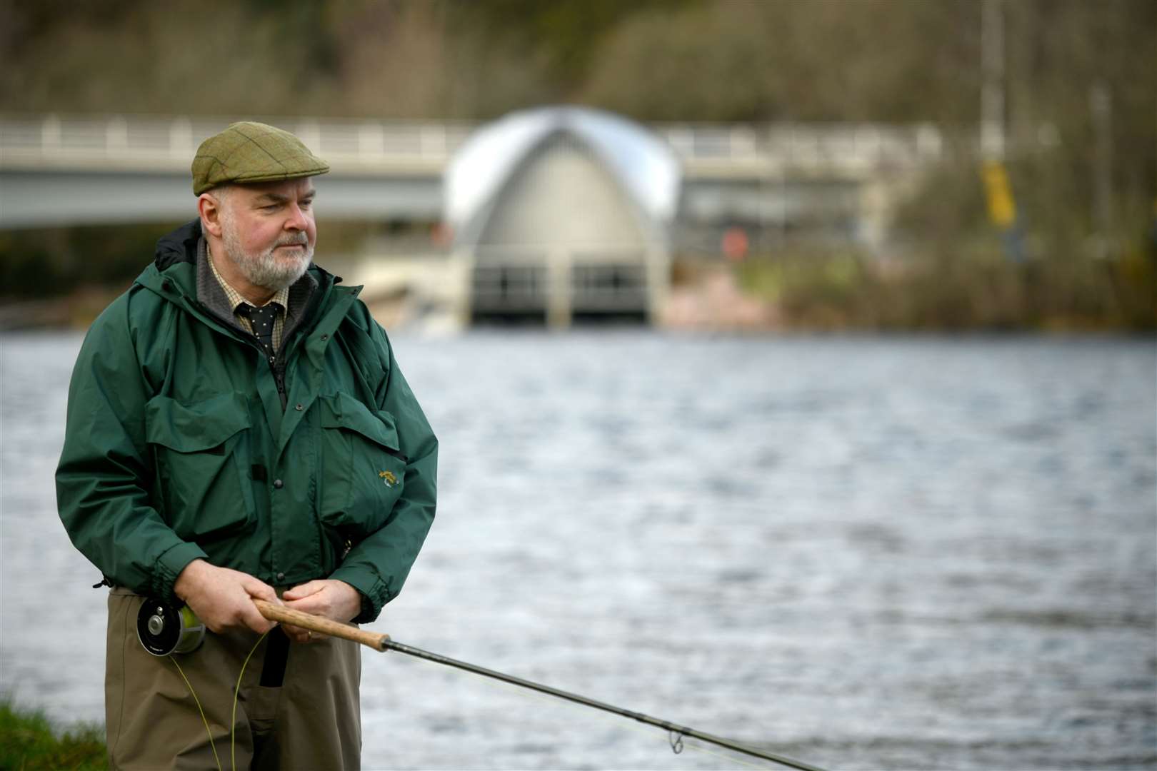 Brian Shaw, the river director of the Ness District Salmon Fishery Board makes the first cast of the 2023 fishing season. Picture: James Mackenzie