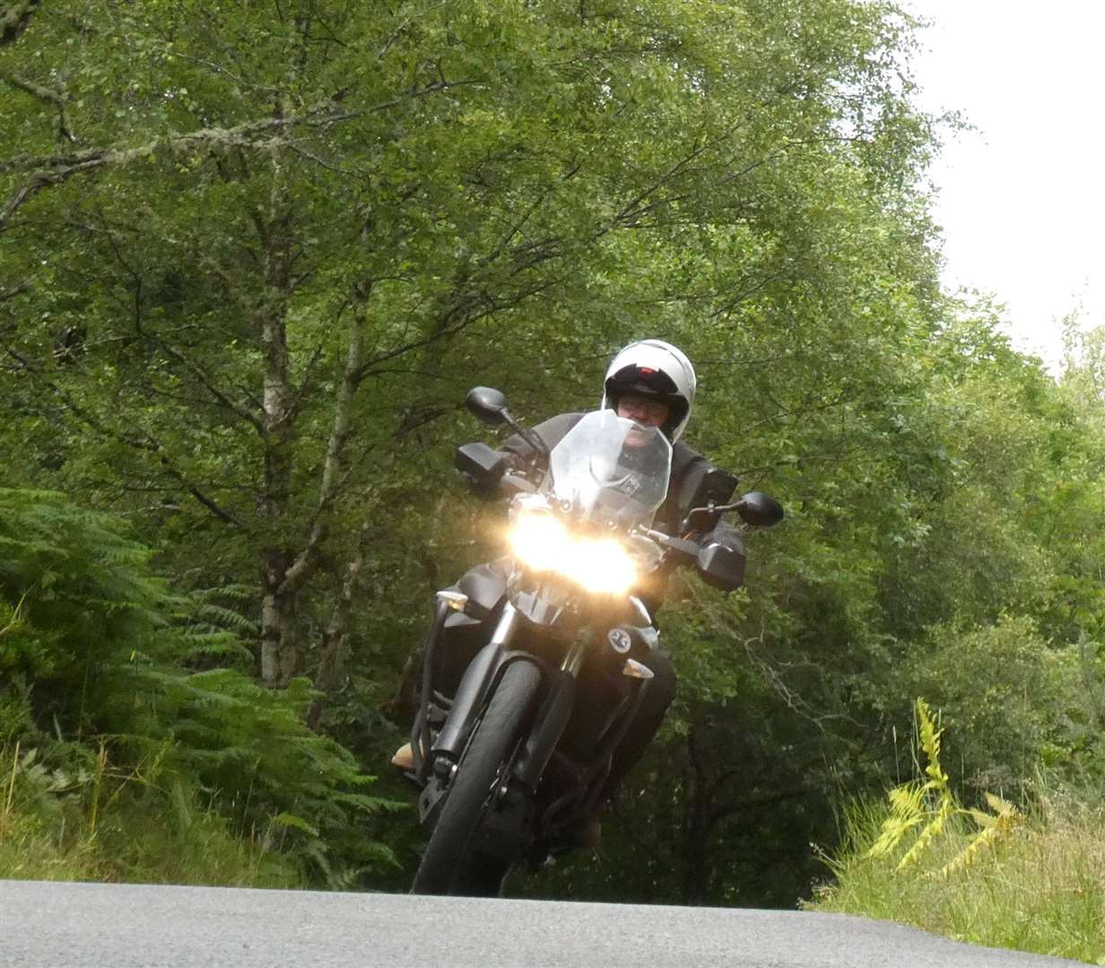 A motorcyclist on the open road during the Arnott Moffat Memorial Run 2022.