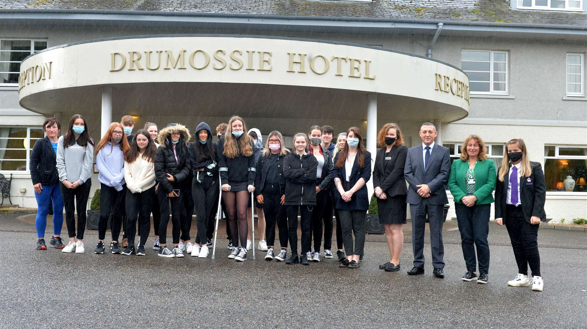 Pupils and staff from Culloden Academy with members of staff from the Drumossie Hotel. Picture: Callum Mackay