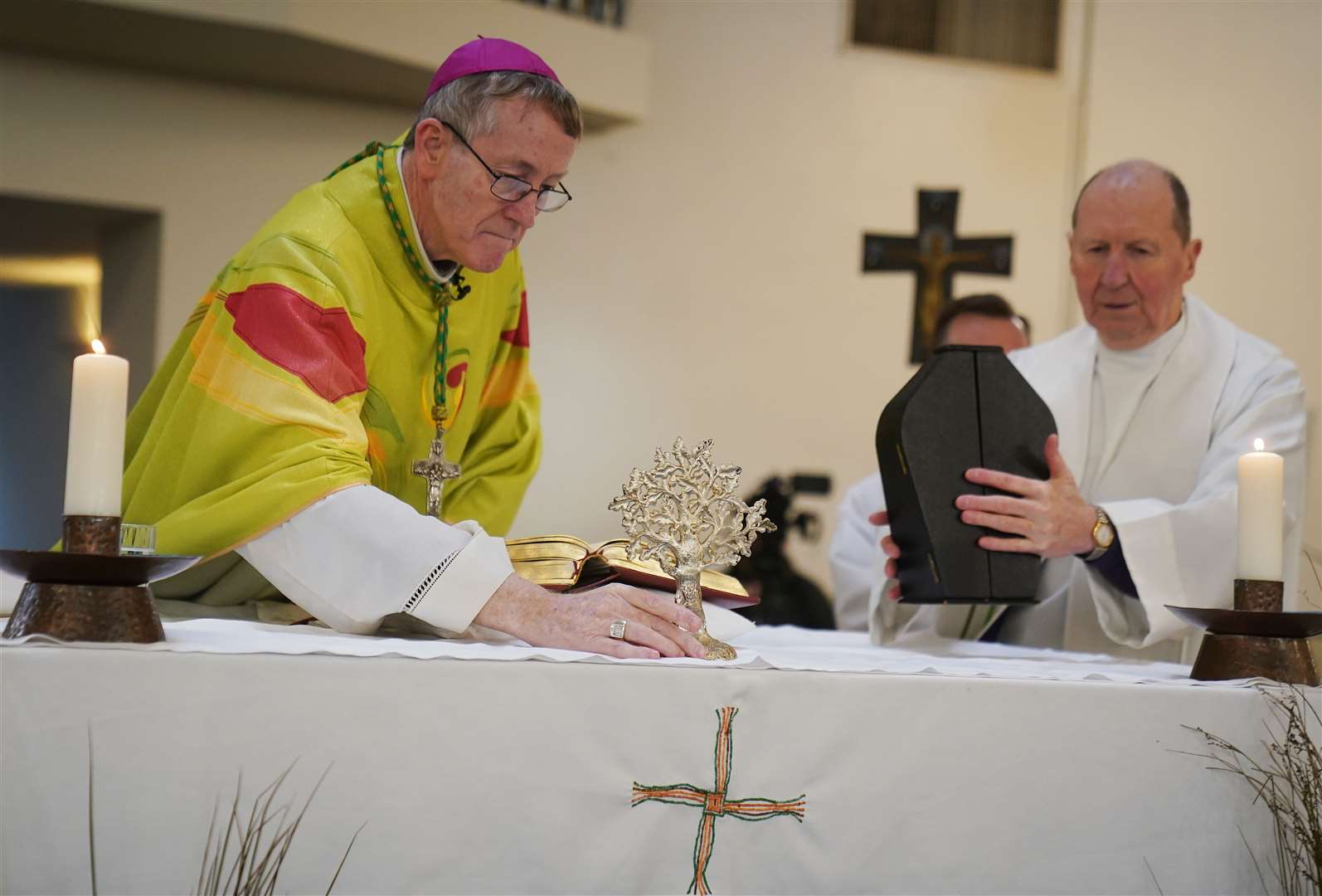 Bishop of Kildare & Leighlin Denis Nulty places the relic of St Brigid on the altar of St Brigid’s Parish Church in Kildare (Brian Lawless/PA)