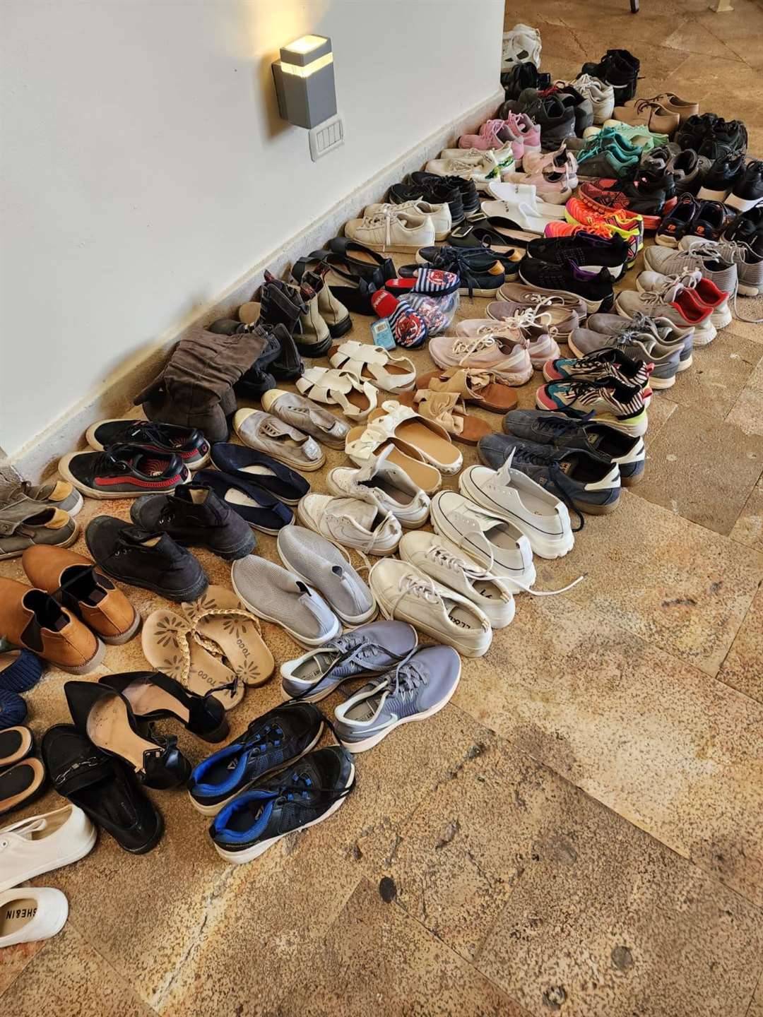 Clothing and shoes have been donated to those sheltering at the hotel on the Dead Sea (Ben/PA)