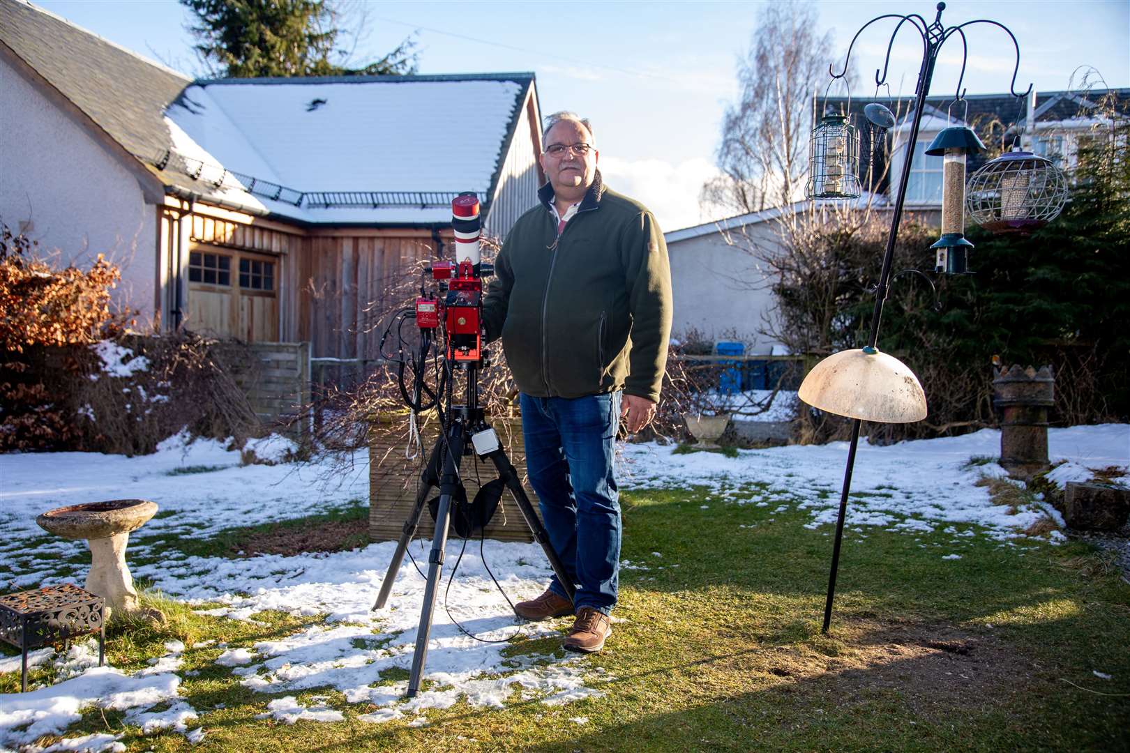 AT HOME: Graham Hazlegreaves with the equipment he uses to capture the stunning images of space. Picture: Aidan Woods.