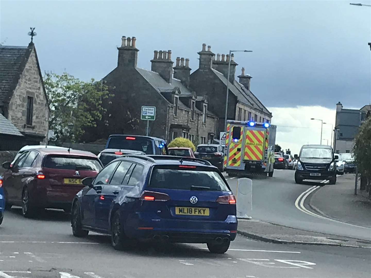 Nairn traffic at a standstill forces an ambulance into the right-hand lane as it attends to an emergency.