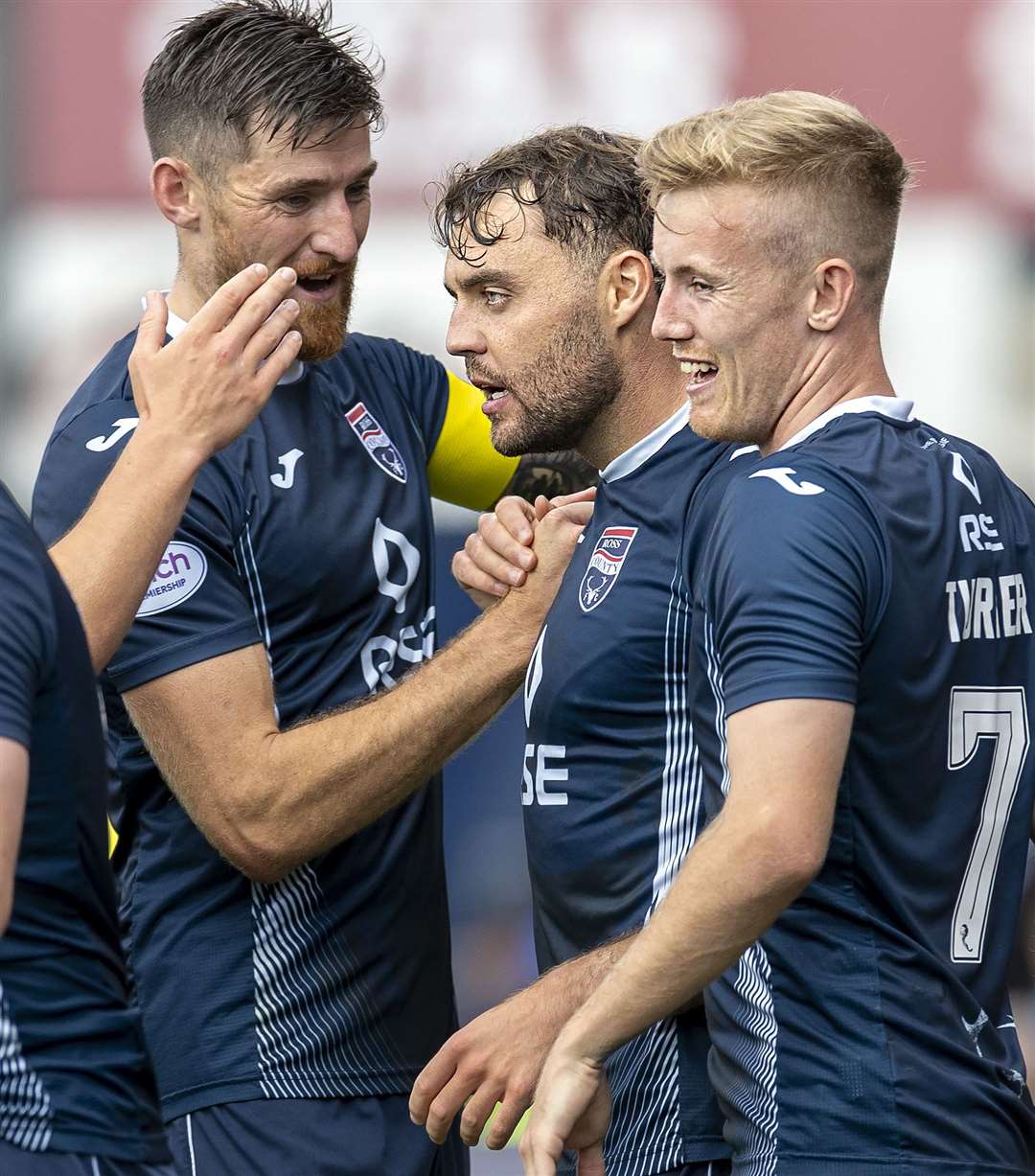 Ross County's Connor Randall (centre) celebrates Saturday's goal against St Johnstone with Jack Baldwin (left) and Kyle Turner.
