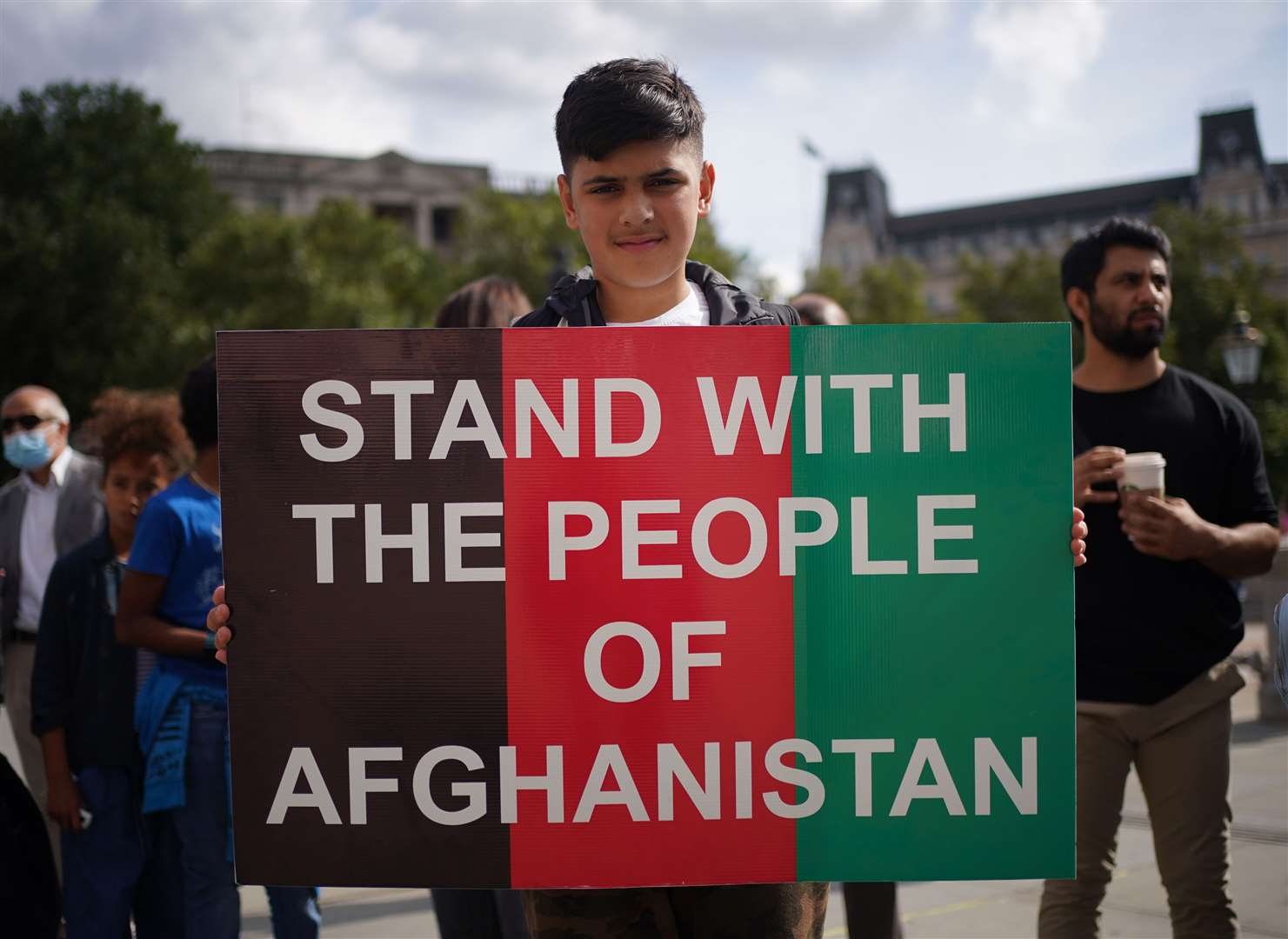 People at an Afghan solidarity rally in Trafalgar Square (Yui Mok/PA)