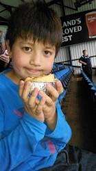 Visiting fans accused Kris Boyd of consuming all the pies. Not true: young Michael here had at least one. Picture: Hector Mackenzie