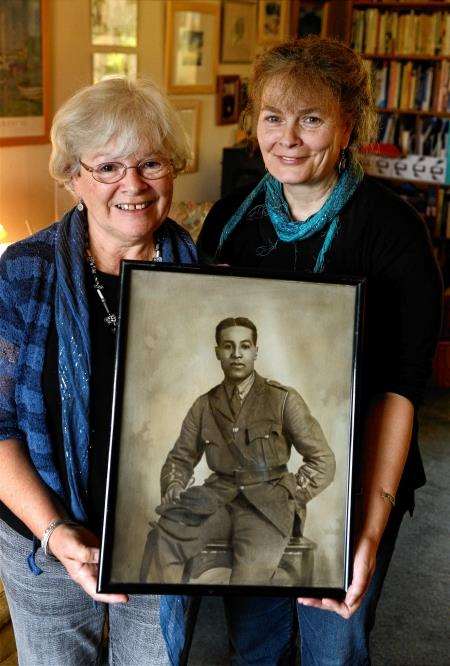 Pat and Iona with a photograph of 'Uncle Walter'. Picture: Gary Anthony.