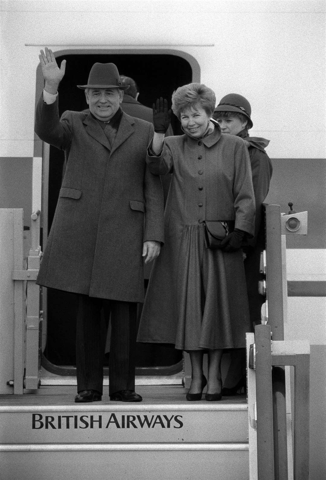 Mikhail Gorbachev and his wife Raisa wave goodbye at Heathrow Airport (Tim Ockenden/PA)
