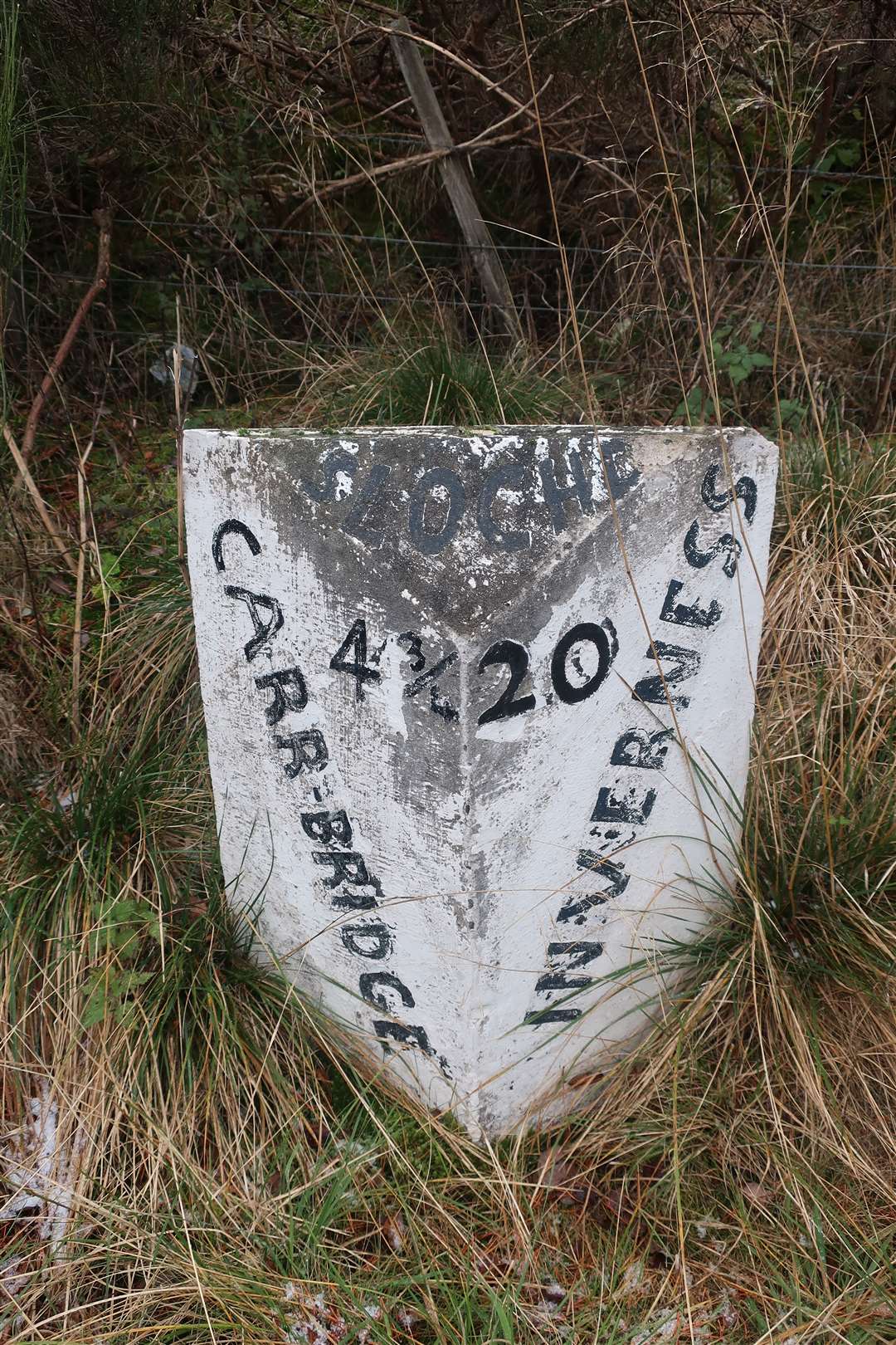 Mile marker on the road at Slochd.