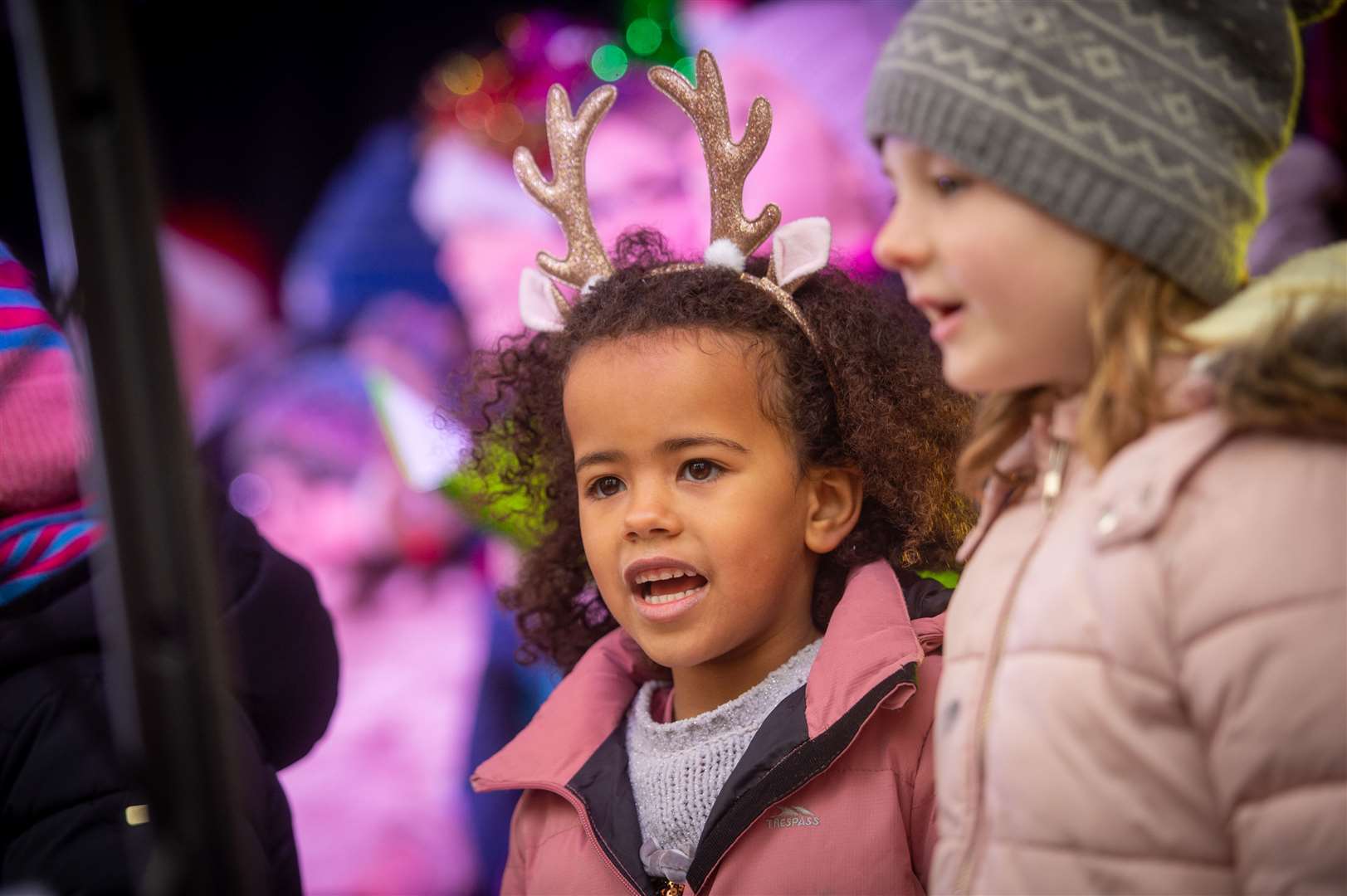 Local children sang Christmas songs for the crowds. Picture: Callum Mackay