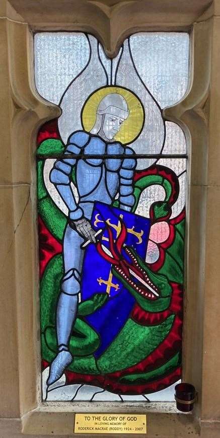 St Michael, slaying a dragon.