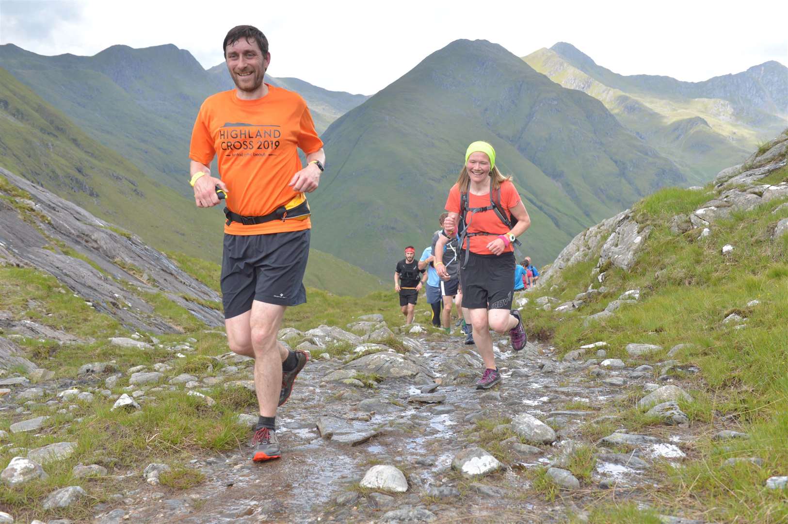 John and Meg Davidson approach the top of the climb above the waterfall in the 2019 Highland Cross. Picture: Robin McConnell