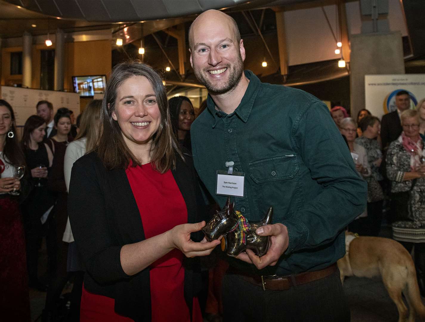 The Shieling Project's Sam Harrison with awards presenter, communities minister Aileen Campbell.