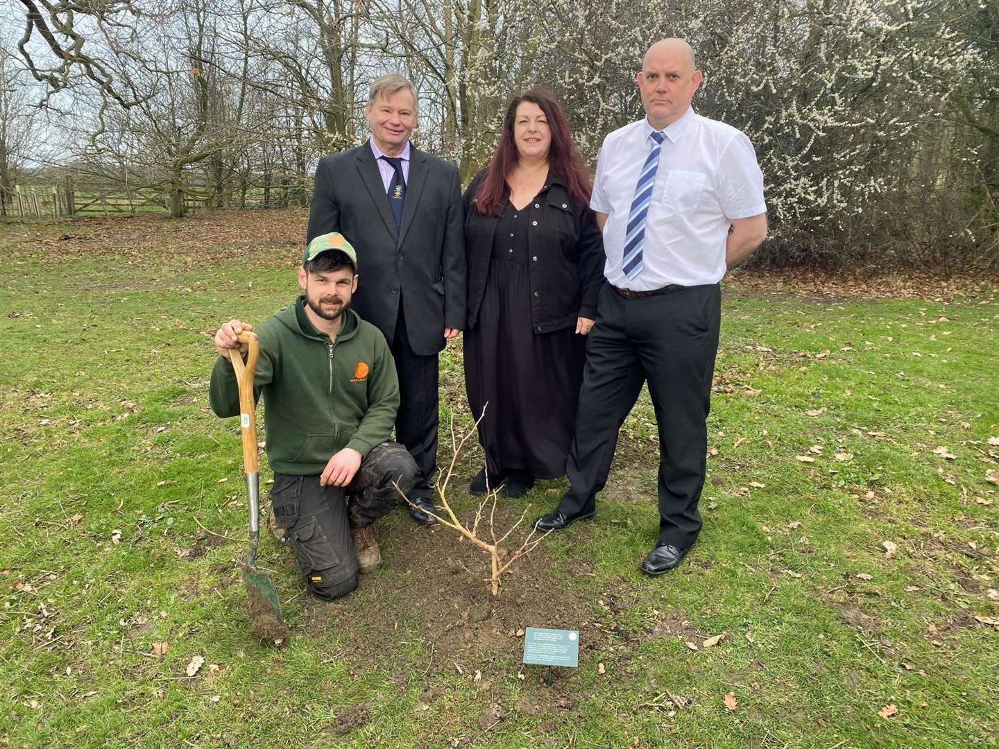 From left, Yorkshire Sculpture Park head groundsman Will Grinder, Mark Brailsford, Janice Wake and Andy Parker, people hub manager at HMP Wakefield with the newly planted mulberry bush (Yorkshire Sculpture Park/PA)