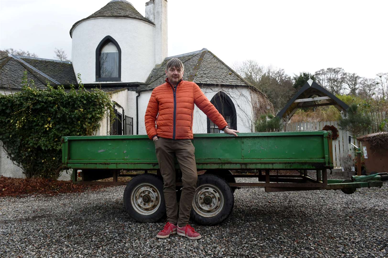 Rory Haigh and his double-axle trailer which he uses to transport garden waste.