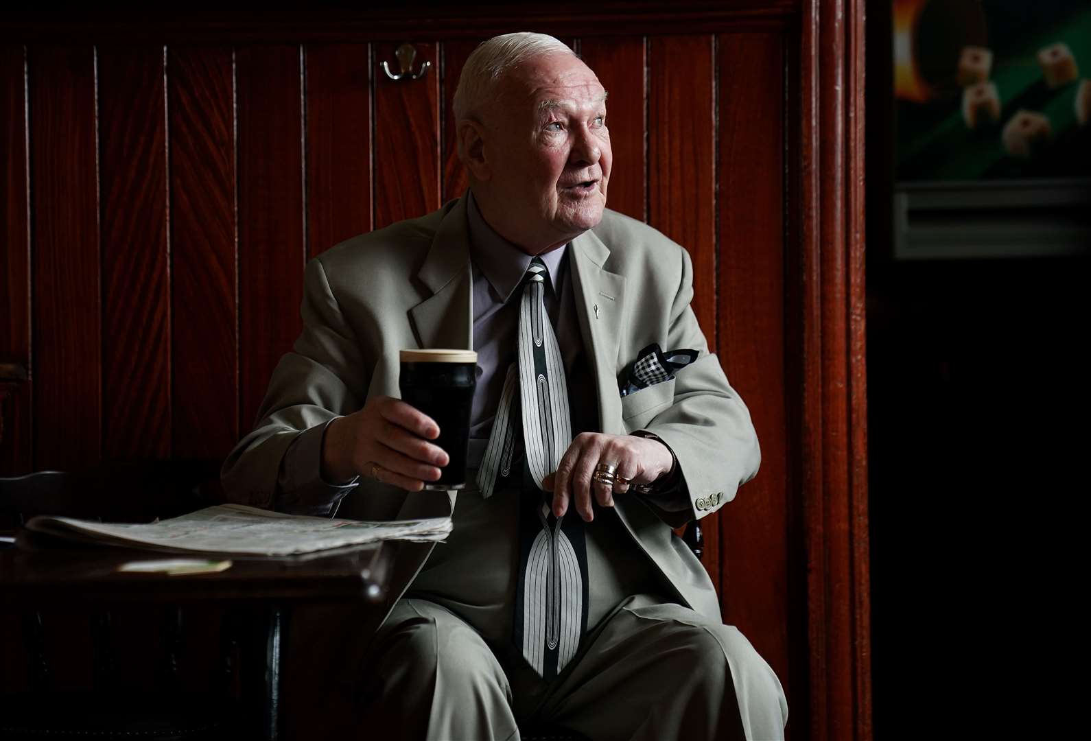 Peter Roche, a regular for 55 years at Mulligans pub in Dublin’s city centre, in conversation while having a pint (Brian Lawless/PA)