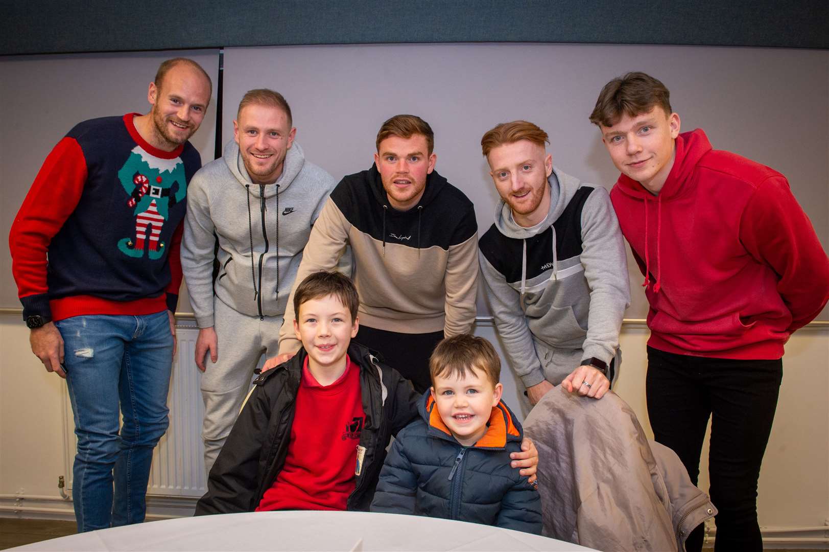 Brothers Liam and Archie McLaughlin with some of the Caley Players.