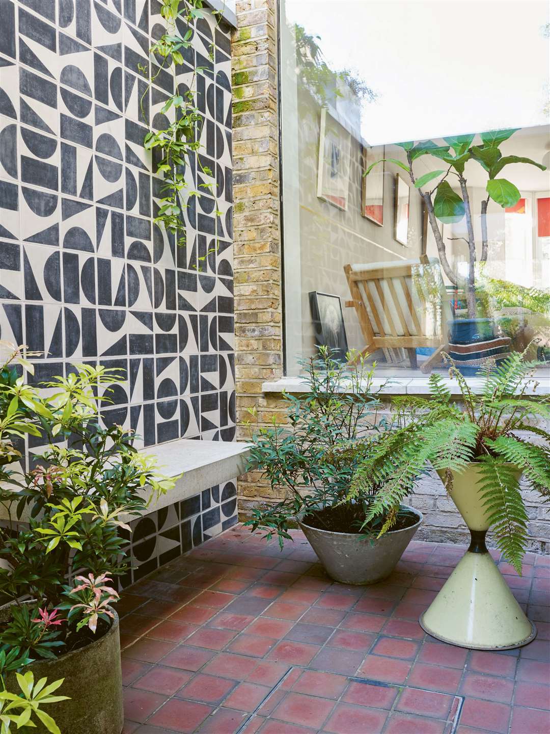 Create a contemporary Mediterranean garden using graphic tiles. Picture: Jason Ingram/Mitchell Beazley/PA