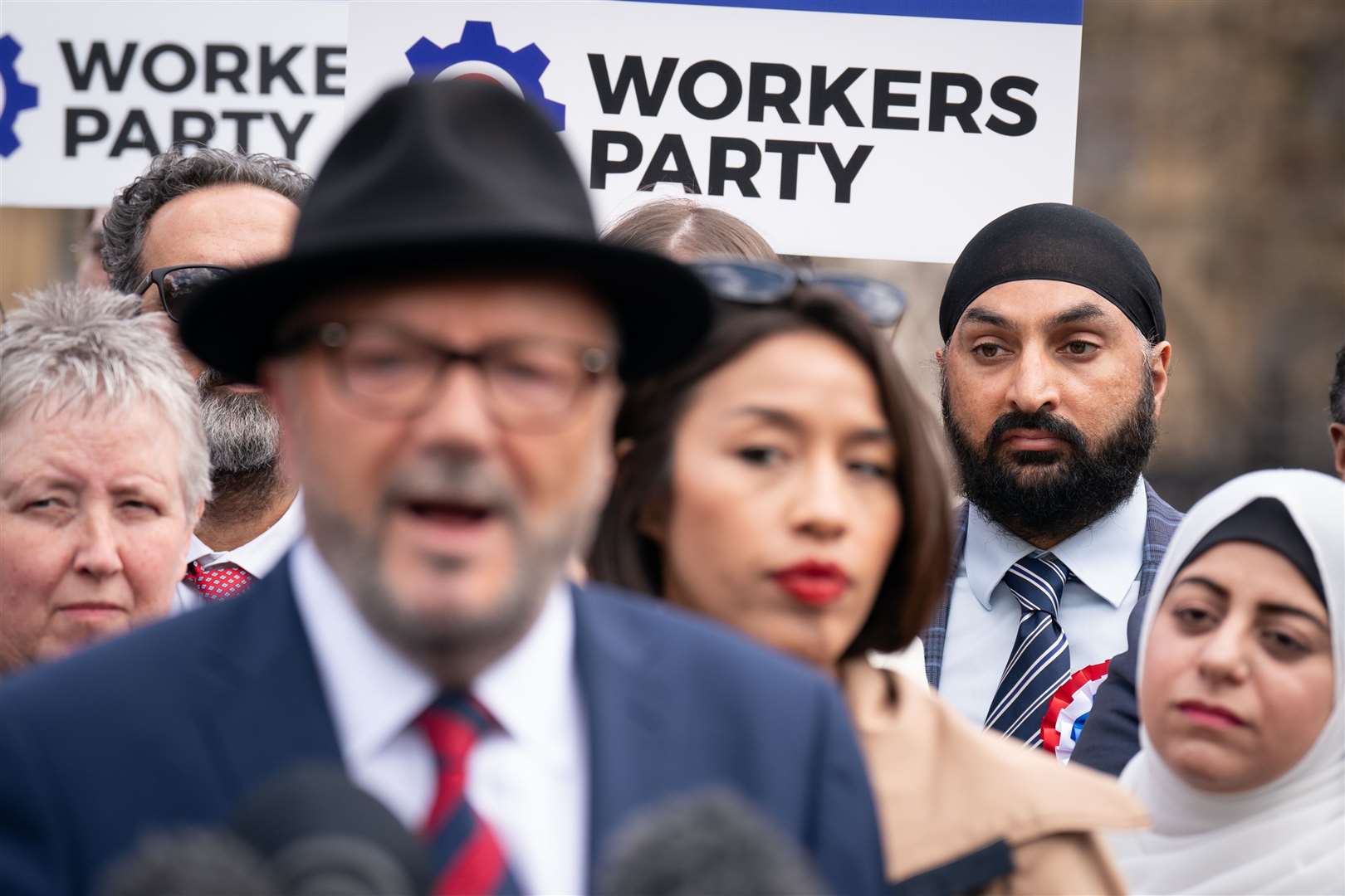 Monty Panesar, back right, said he did not think Labour was representing working-class people (Stefan Rousseau/PA)