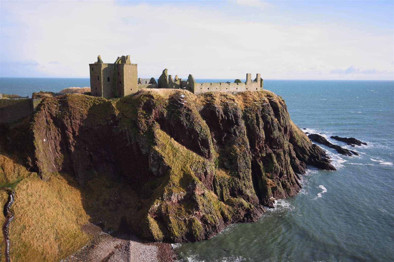 Dunnottar Castle with snow on the ground, Scotland