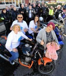 Charlie's Tea Party organiser Audrey MacKinnon (left) with husband Robert and members of Highland Bikers.