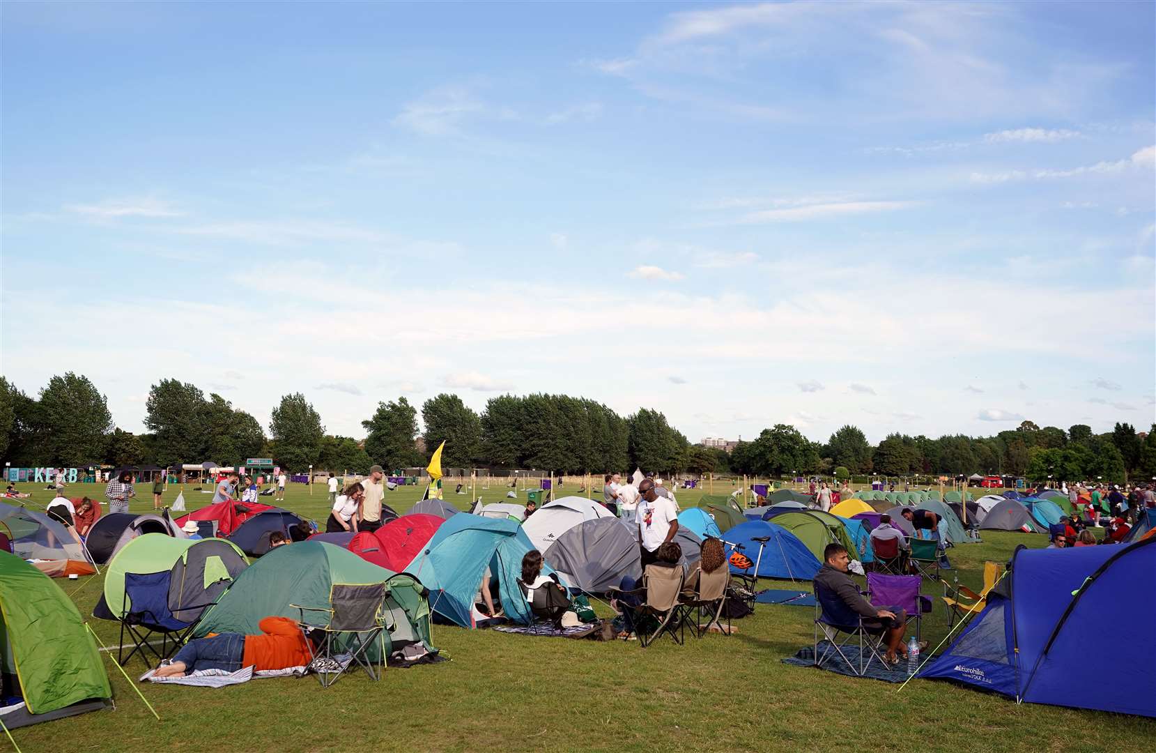 Campers form the overnight queue ahead of the 2022 Wimbledon Championship (Zac Goodwin/PA)