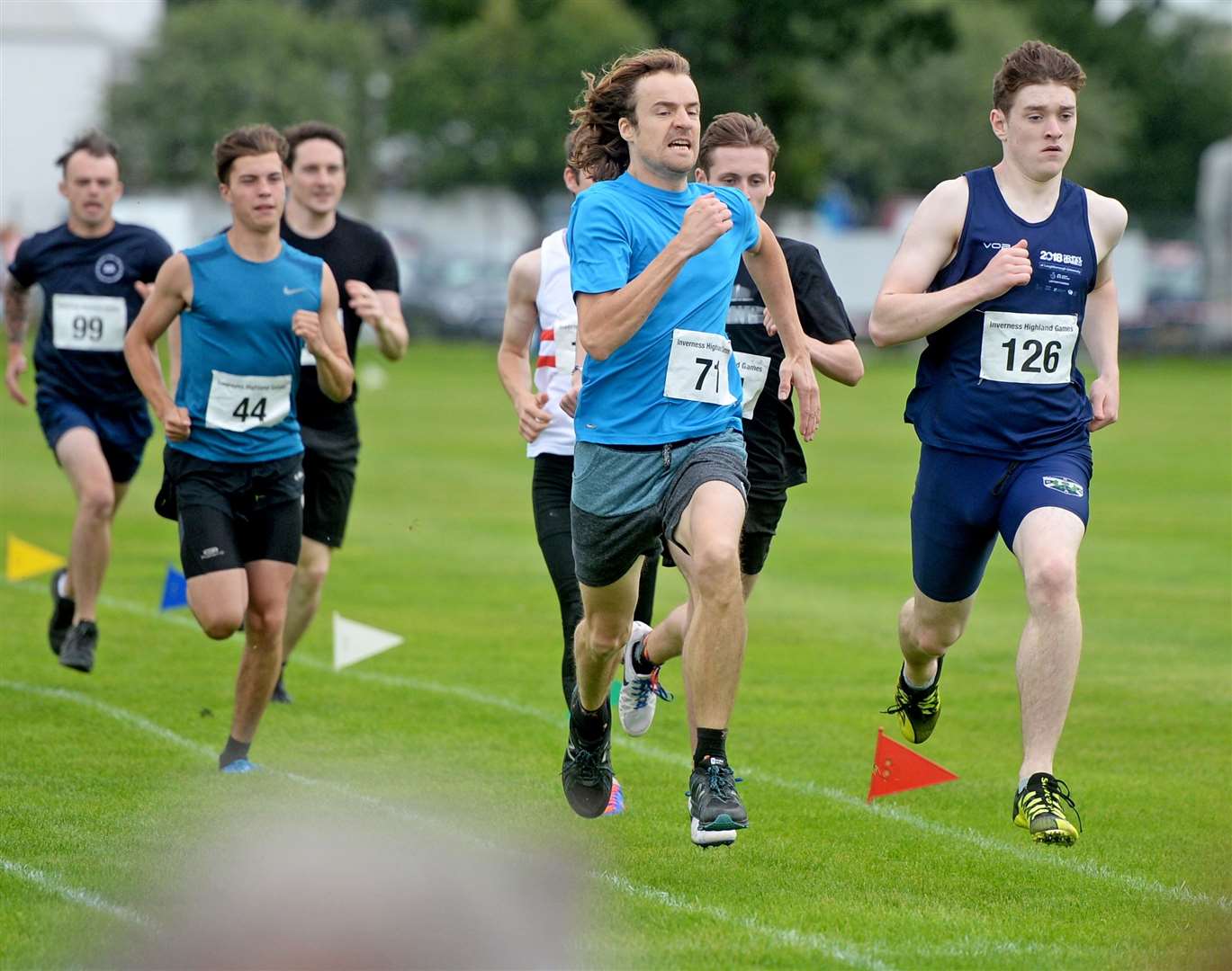 The competition was strong in the 400m mens race. Amongst the competitors was Dingwall runner Ruairidh Munro (right). Picture: Gair Fraser.