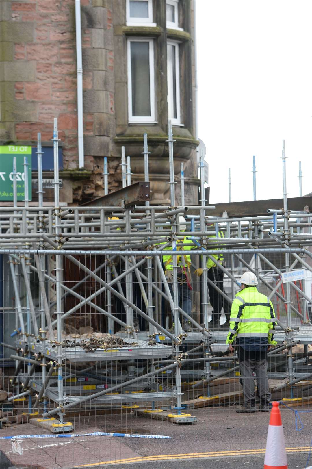 Workmen on site at Grant Street building Thursday morning..Picture: Gary Anthony..