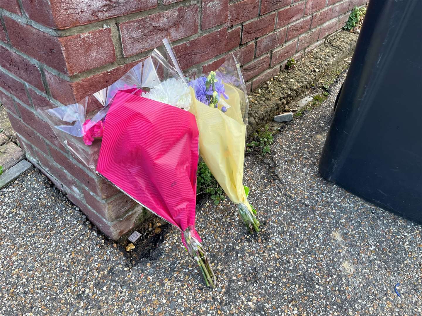 Flowers left at the scene in The Row in Sutton (Sam Russell/PA)